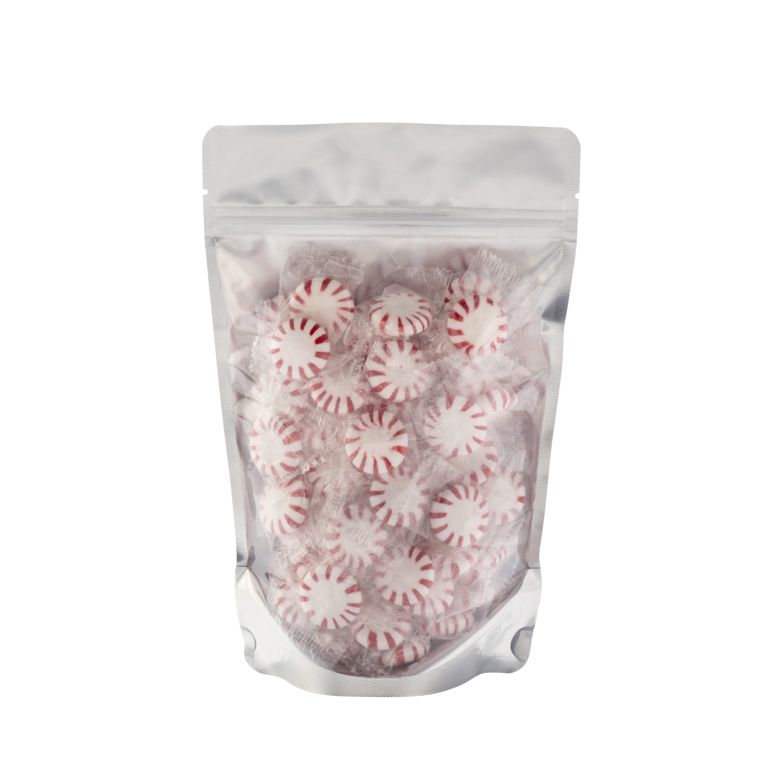 Transparent container with red and white candy inside